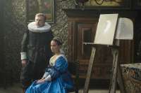 Das Ehepaar posiert für den Maler.  (Christoph Waltz, Alicia Vikander) Das Ehepaar posiert für den Maler. (Christoph Waltz, Alicia Vikander)