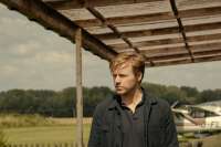 Jack Lowden ist River Cartwright, einer der Haupthelden im Slough House, in der Buch- wie in der TV-Serie. 